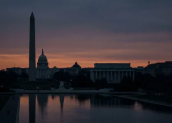 The silhouette of Washington D.C. landmarks against a dusk sky.